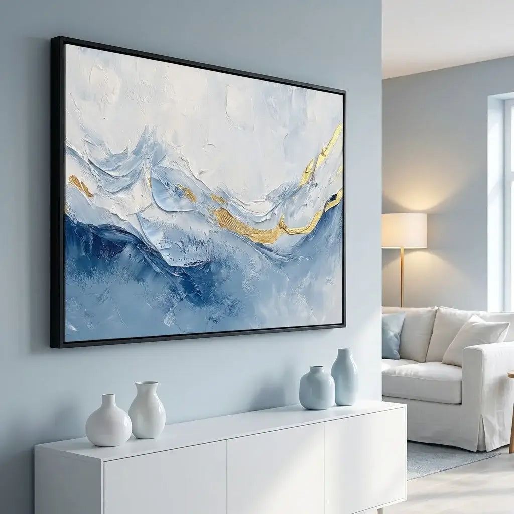 Abstract painting with blue and gold tones in a modern living room.