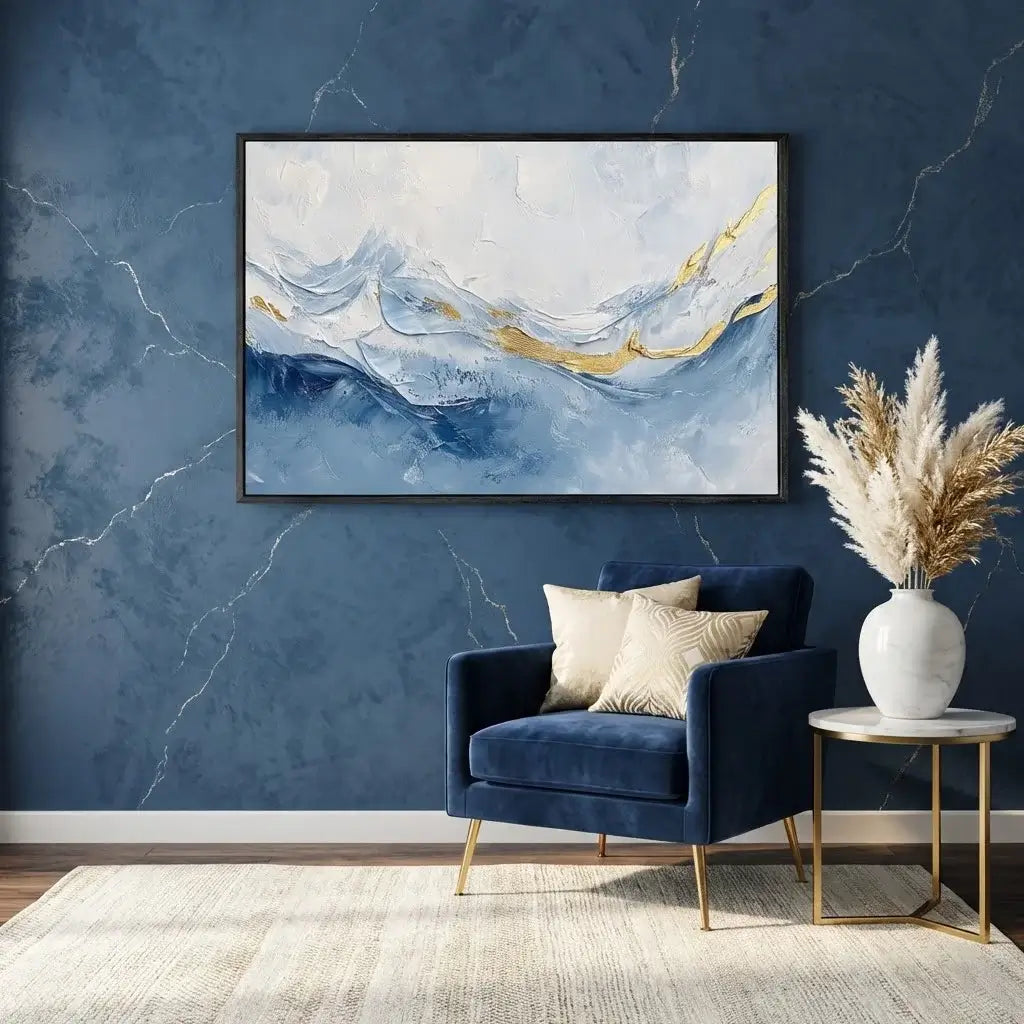 Modern interior with a blue armchair, abstract painting, and decorative elements against a blue marble wall.