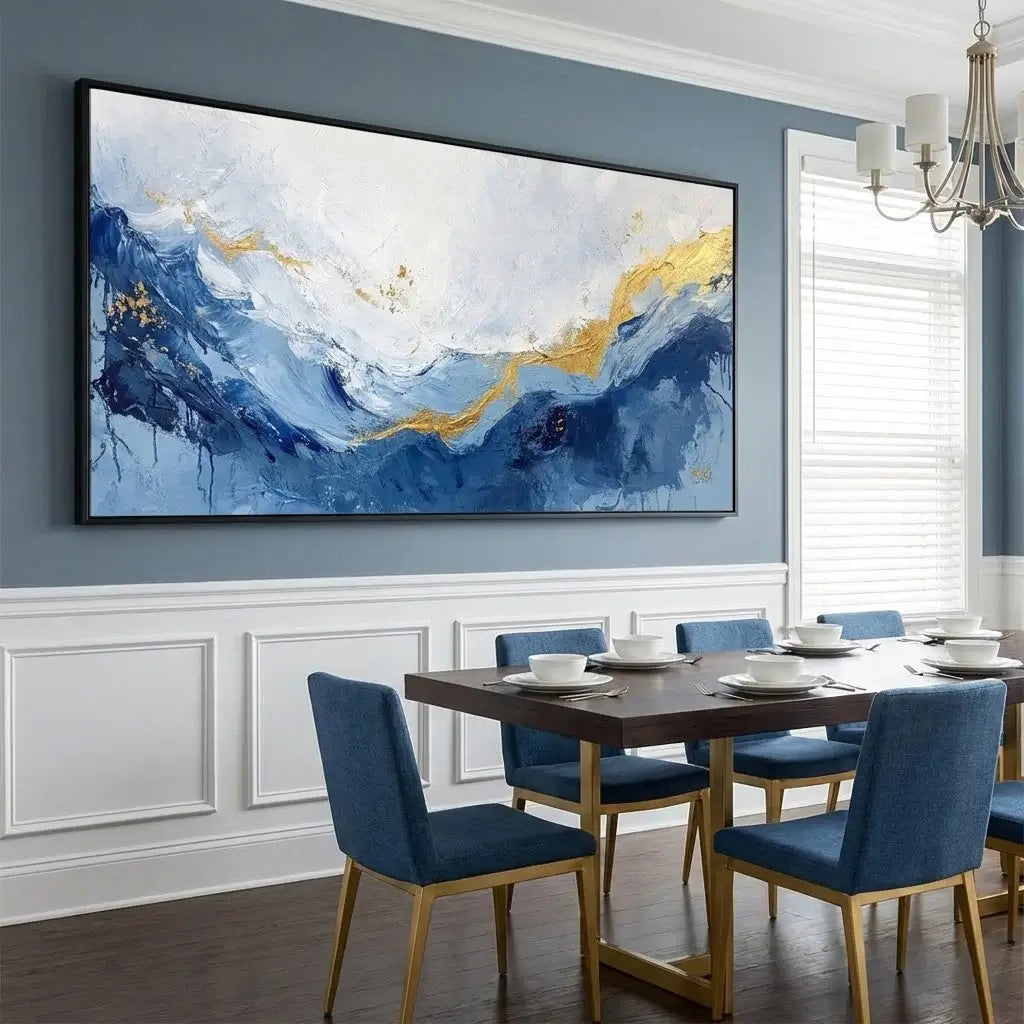 Dining room with a large abstract painting on the wall above a wooden table with blue chairs.