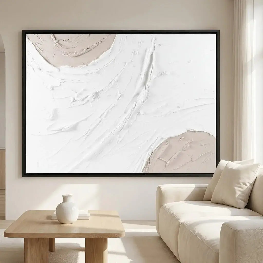 Abstract art piece in a modern living room setting with a sofa and coffee table.