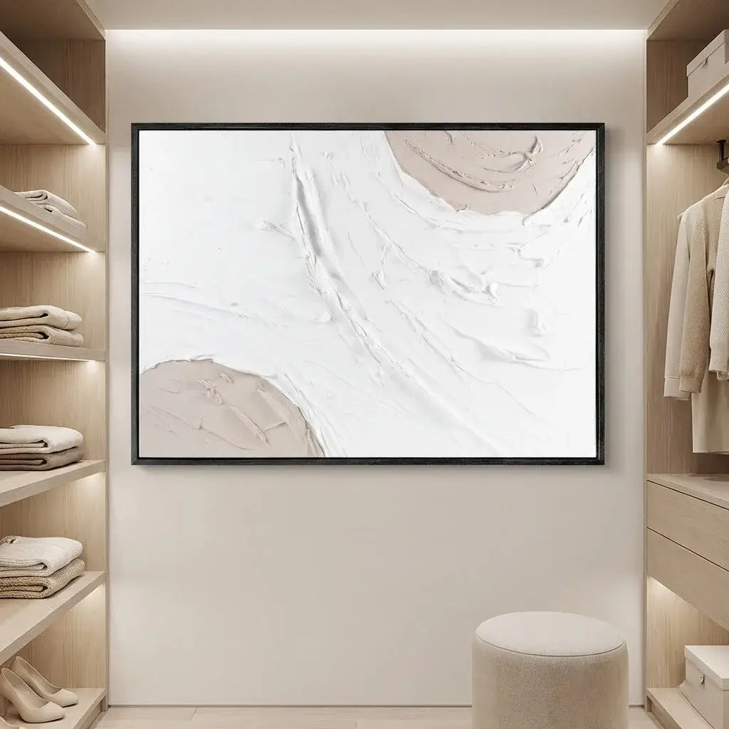 Abstract art piece on a wall in a modern interior setting with shelves and clothing.