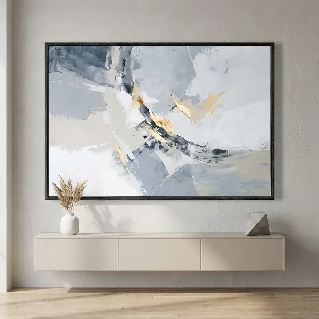 Abstract painting on a wall above a light-colored console table.
