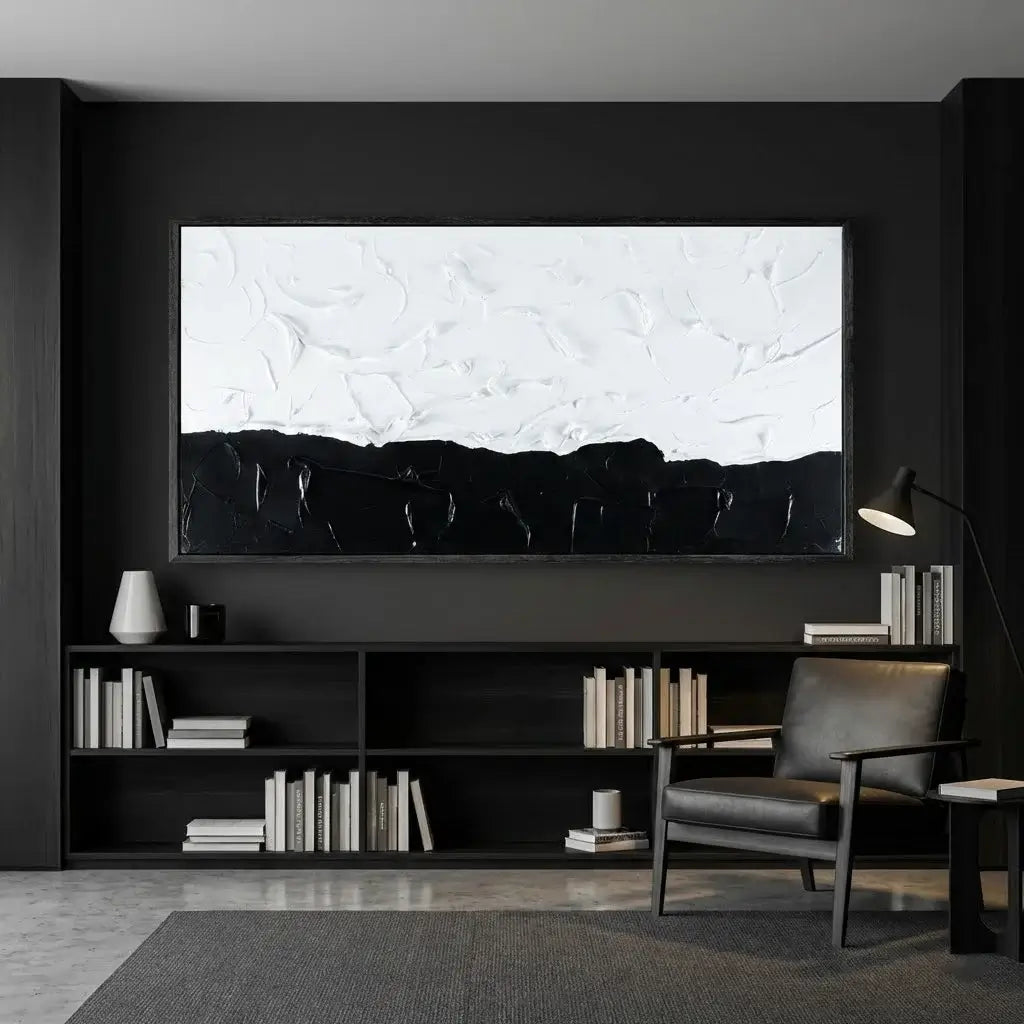 Modern living room with black walls, a gray sofa, and a large abstract painting.