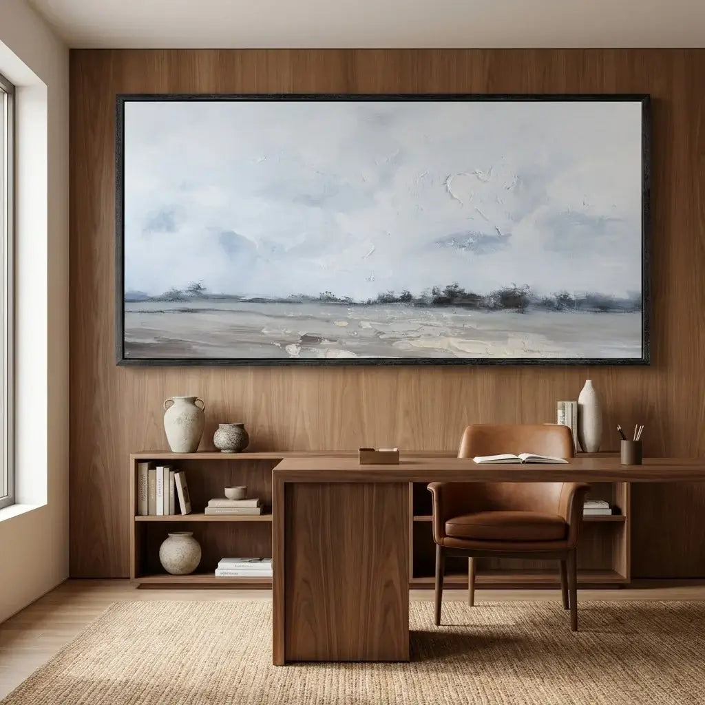 Modern office with wooden desk, chair, and wall art