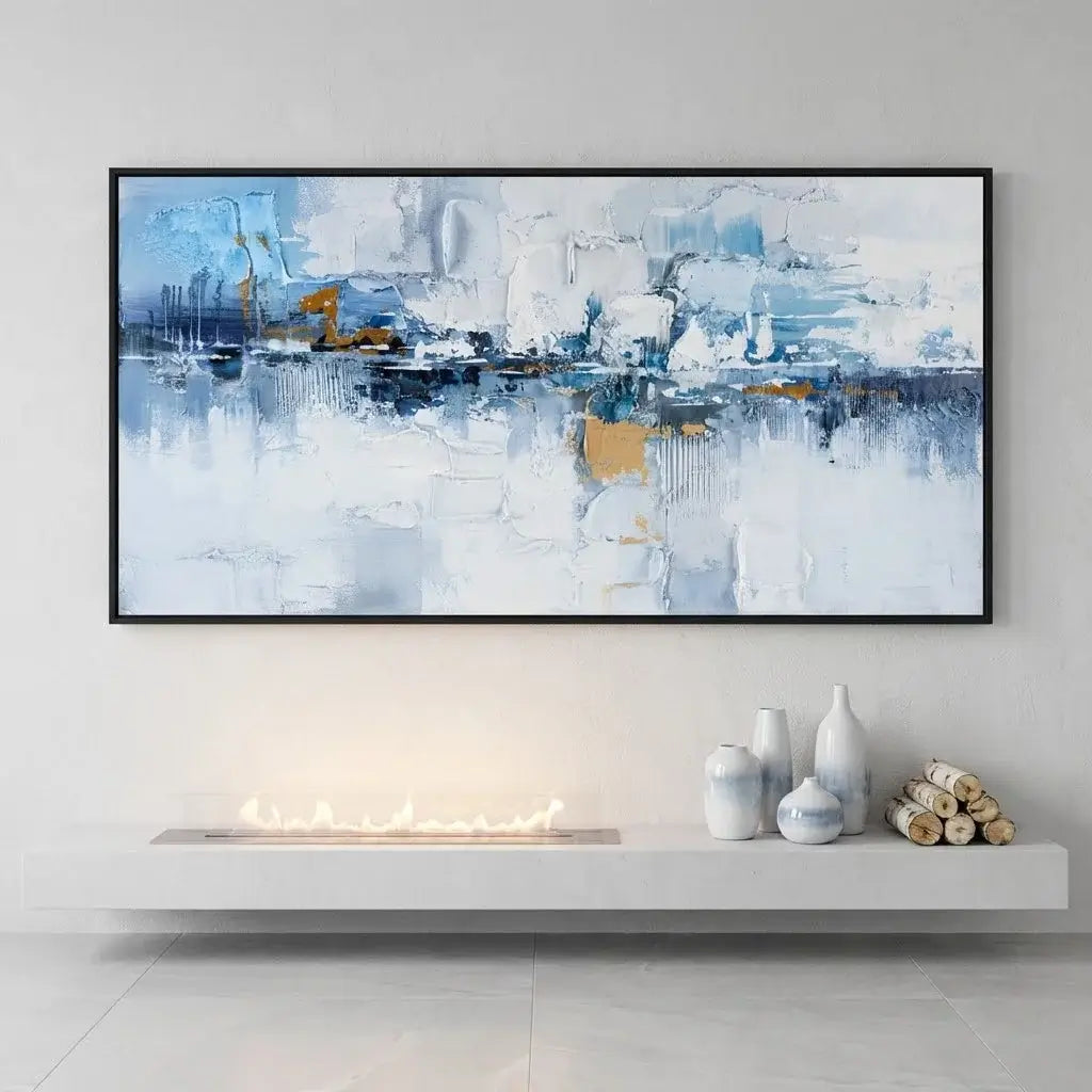 Abstract painting in a modern living room with a fireplace and decorative items.