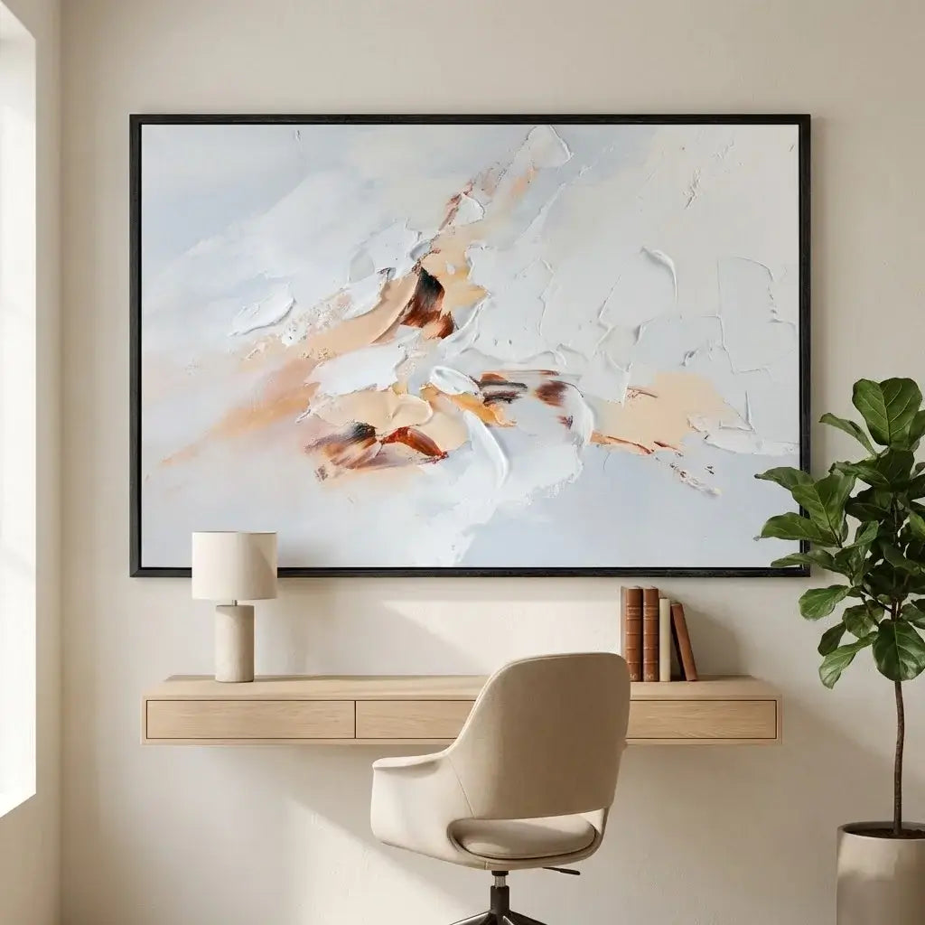 Modern office setup with abstract art, desk, chair, and plant.