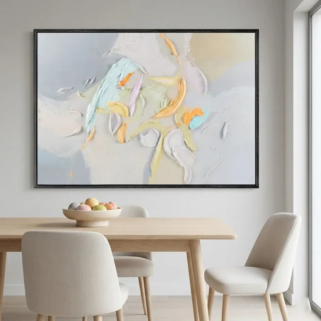 Abstract painting in a modern dining room with a table and chairs.