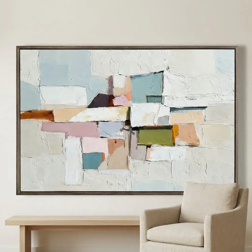 Abstract art piece with pastel colors in a modern living room setting.
