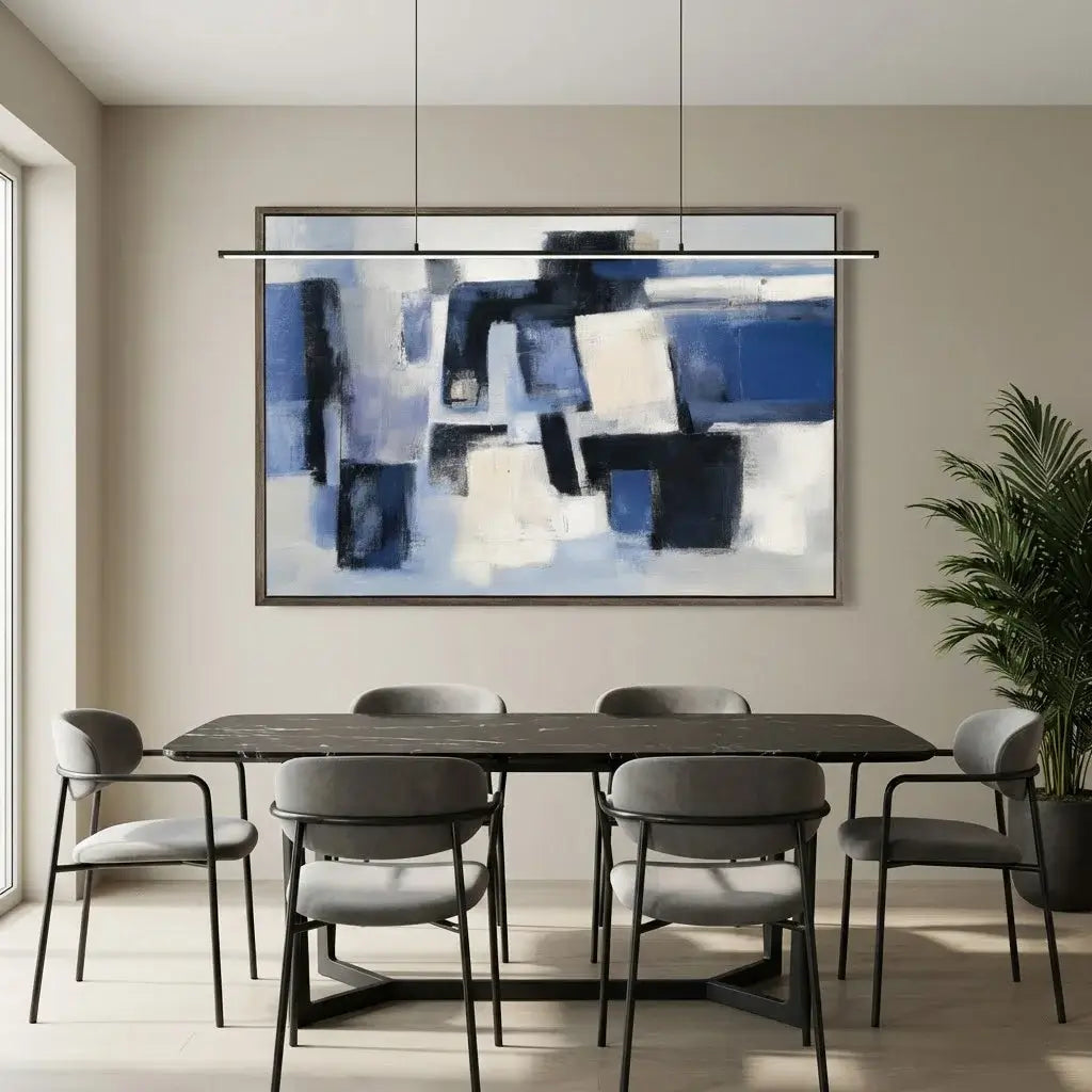Modern dining room with a abstract painting on the wall, table, and chairs.