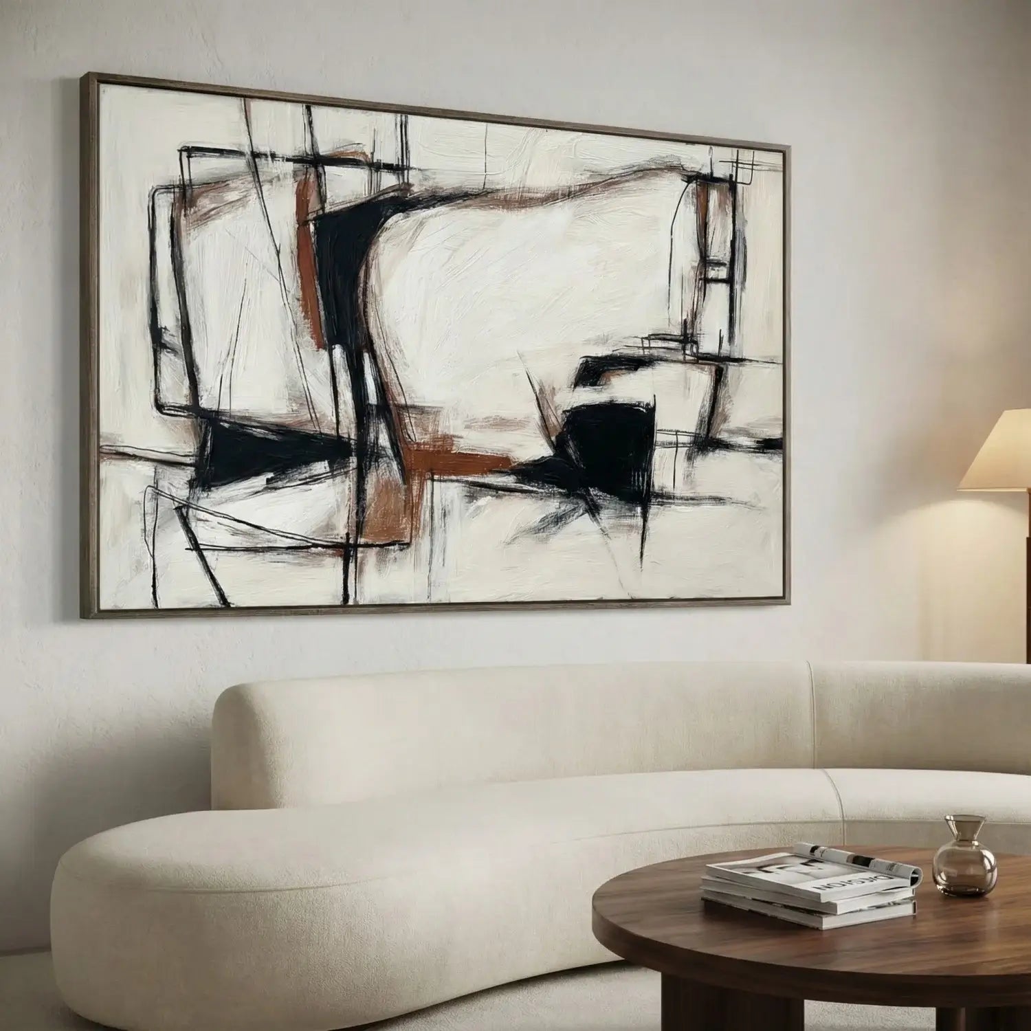 Abstract painting on a wall above a sofa in a living room