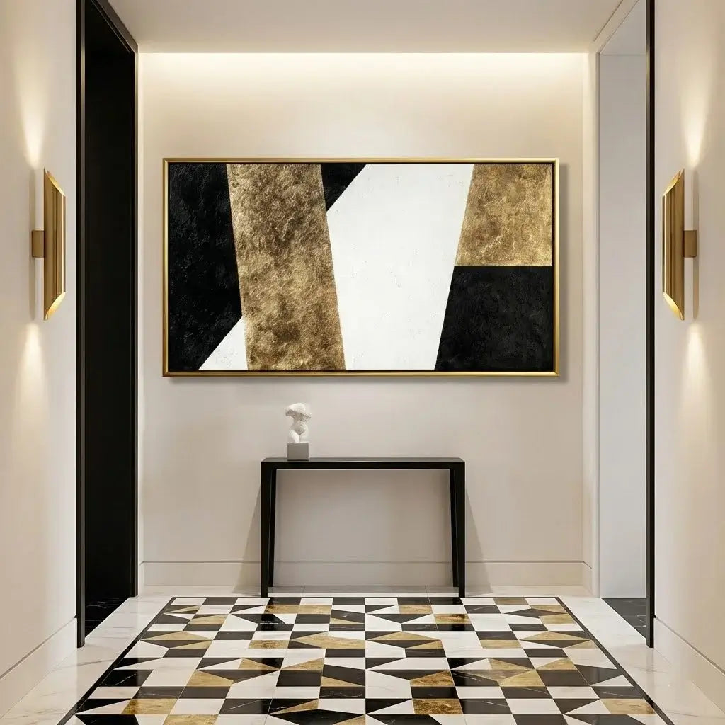 Modern interior hallway with abstract art, console table, and geometric floor pattern.