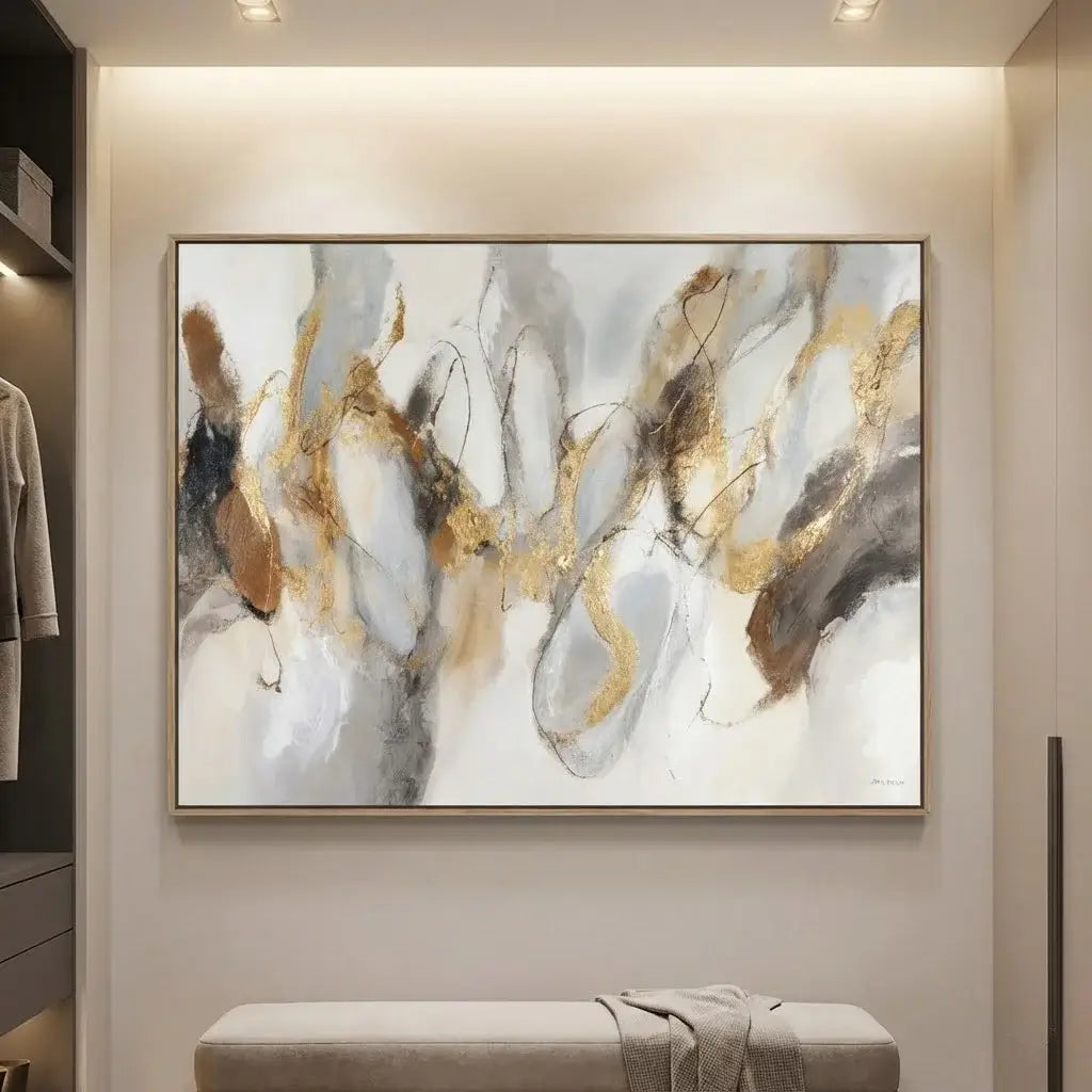 Abstract art painting in a modern interior setting with a bench below.