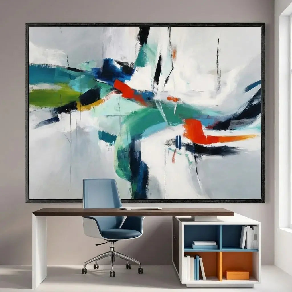 Modern office setup with a colorful abstract painting on the wall.