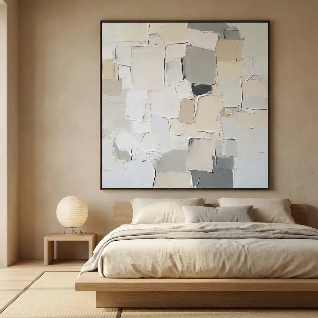 Modern bedroom with a large abstract painting above a bed.