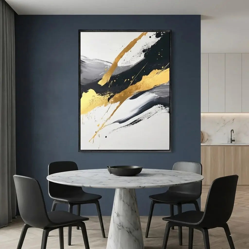 Modern dining room with a marble table and black chairs, abstract art on the wall.