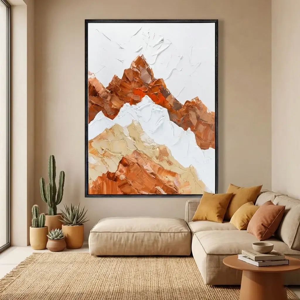 Living room with a large abstract mountain painting, beige sofa, and potted plants.