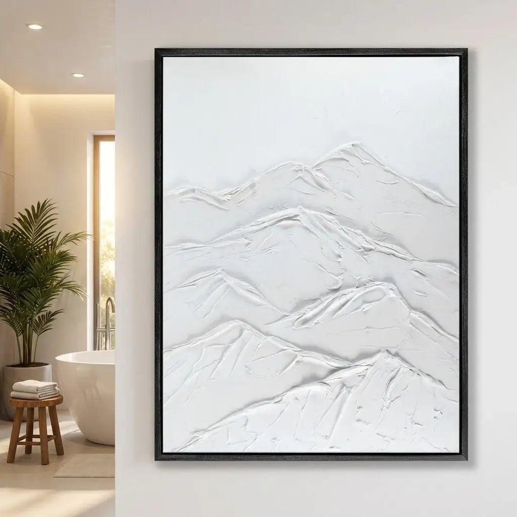 Framed abstract mountain art on a wall in a modern interior setting.