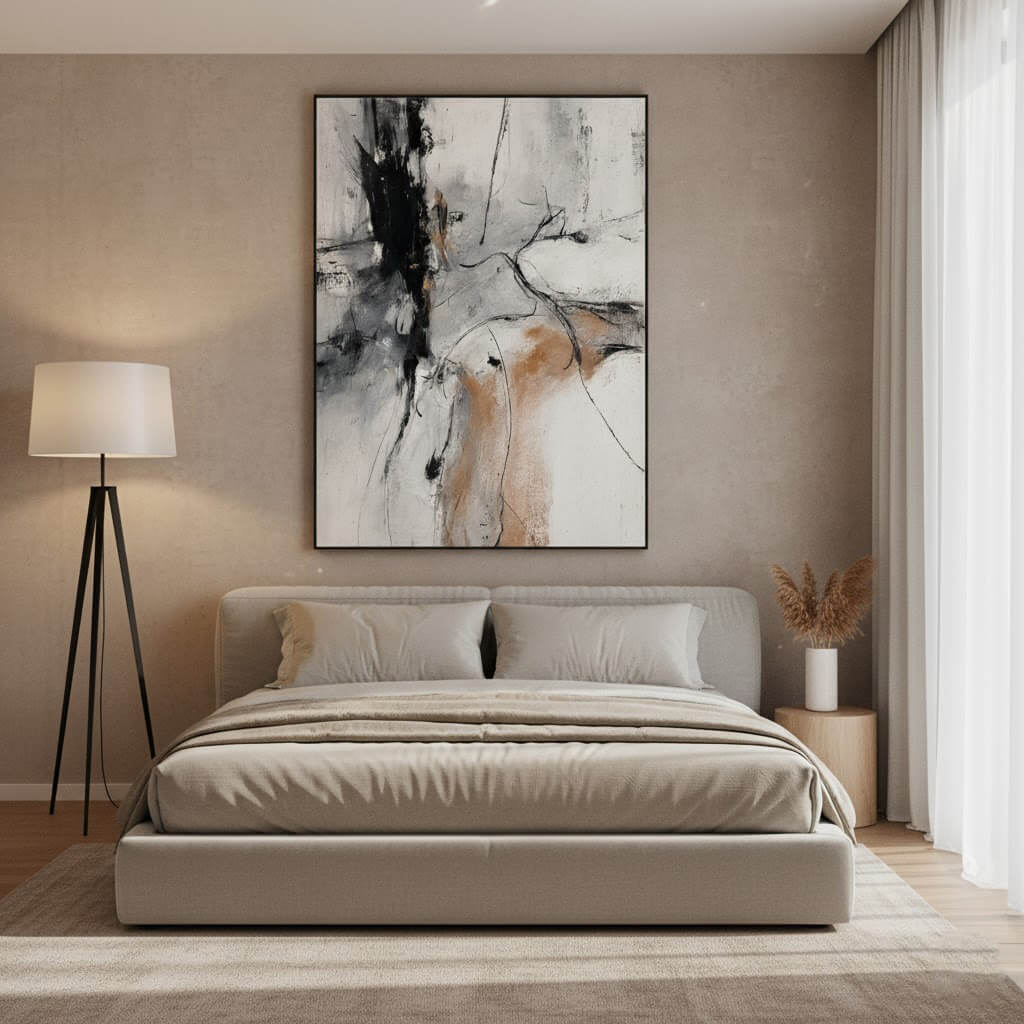 Modern bedroom with abstract art on the wall, bed, and lamp.
