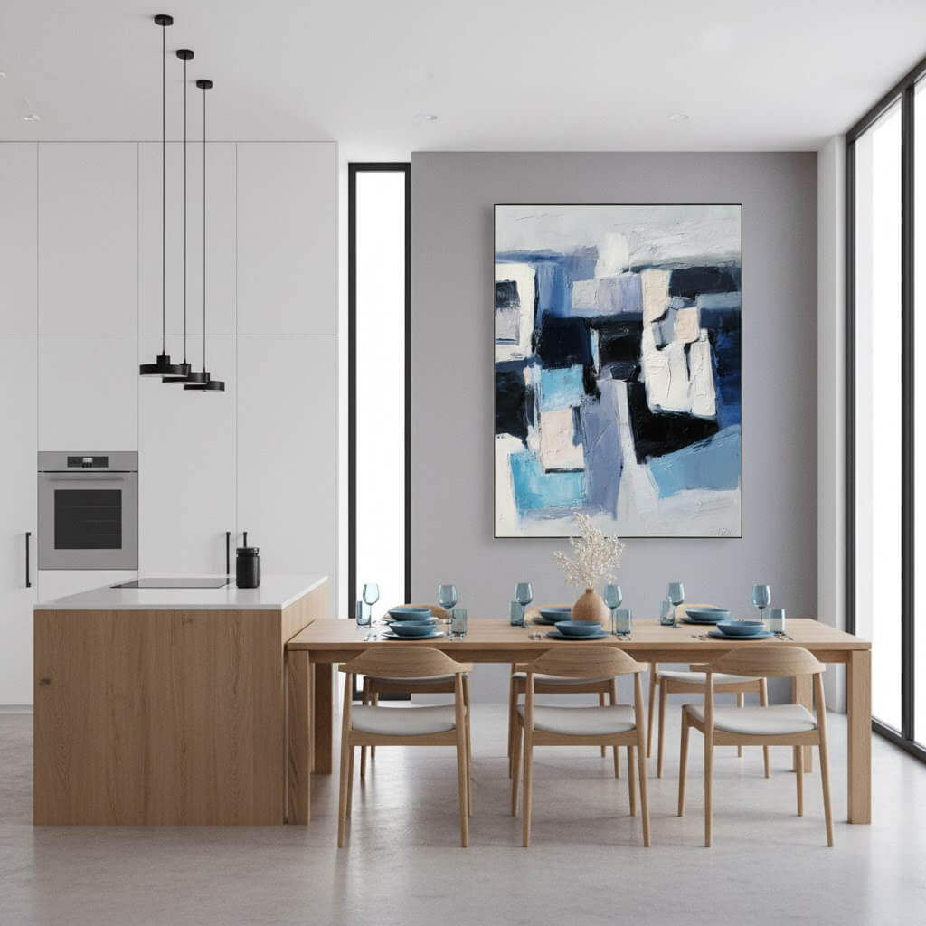 Modern kitchen and dining area with a abstract painting on the wall.