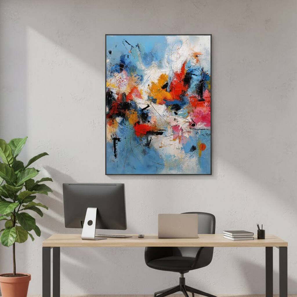 Colorful abstract painting above a desk with office furniture.
