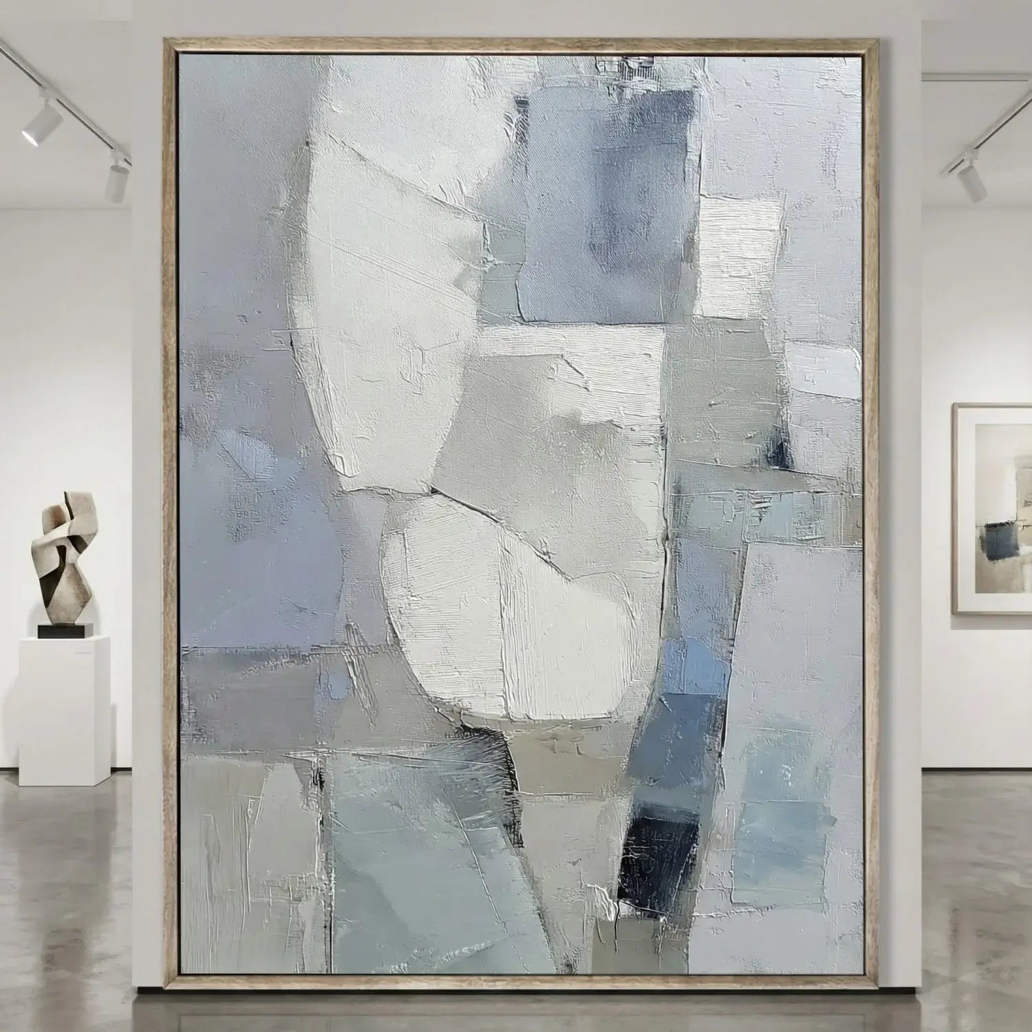 Abstract art piece in a gallery setting with other artworks.