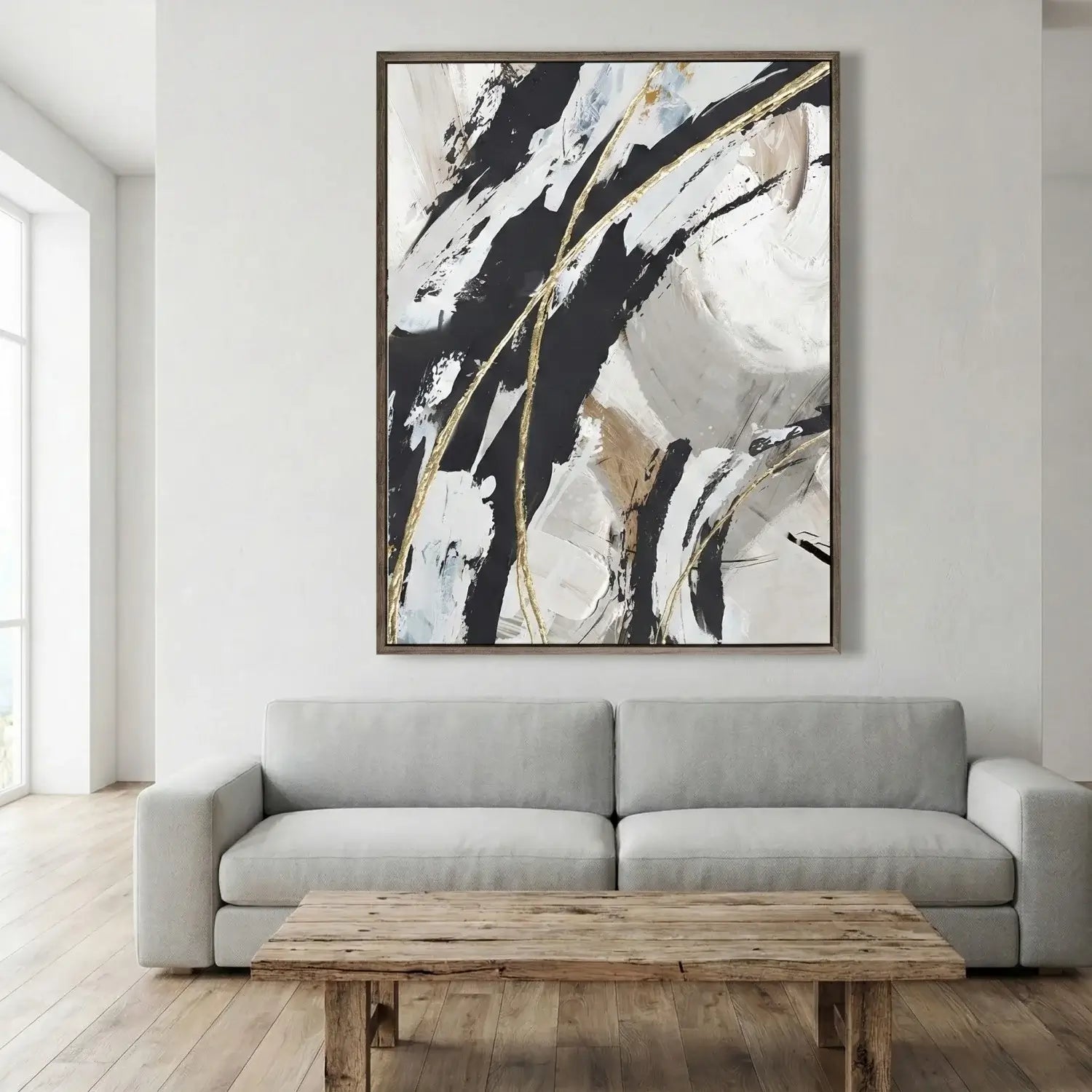 Abstract art piece on a wall above a sofa in a modern living room.