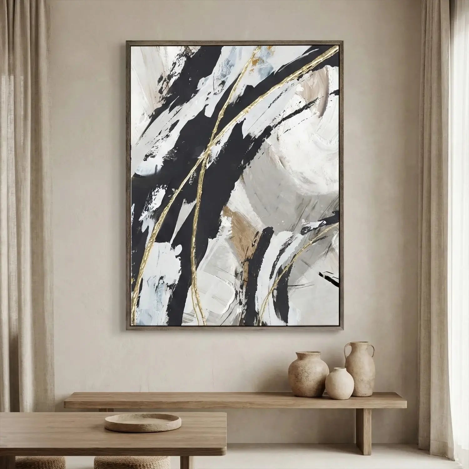 Abstract art piece on a wall above a wooden bench with decorative vases.