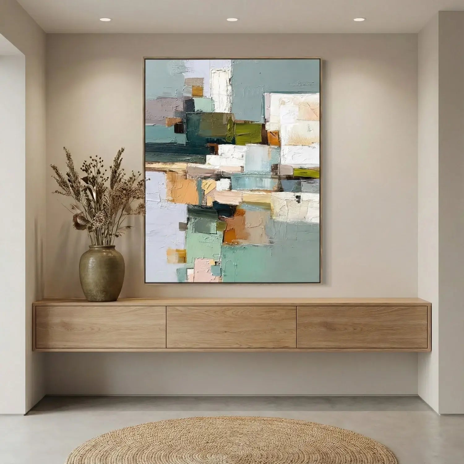 Modern interior with abstract painting on the wall above a wooden console table.