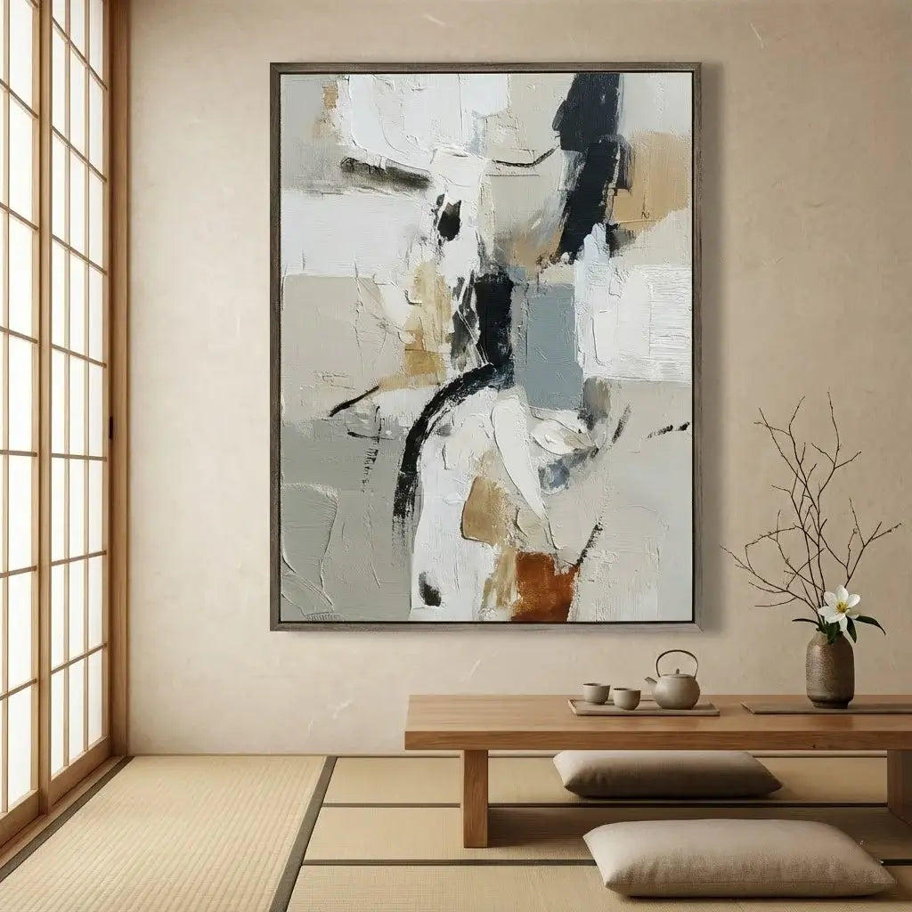 Abstract painting in a modern room with a wooden table and decorative items.