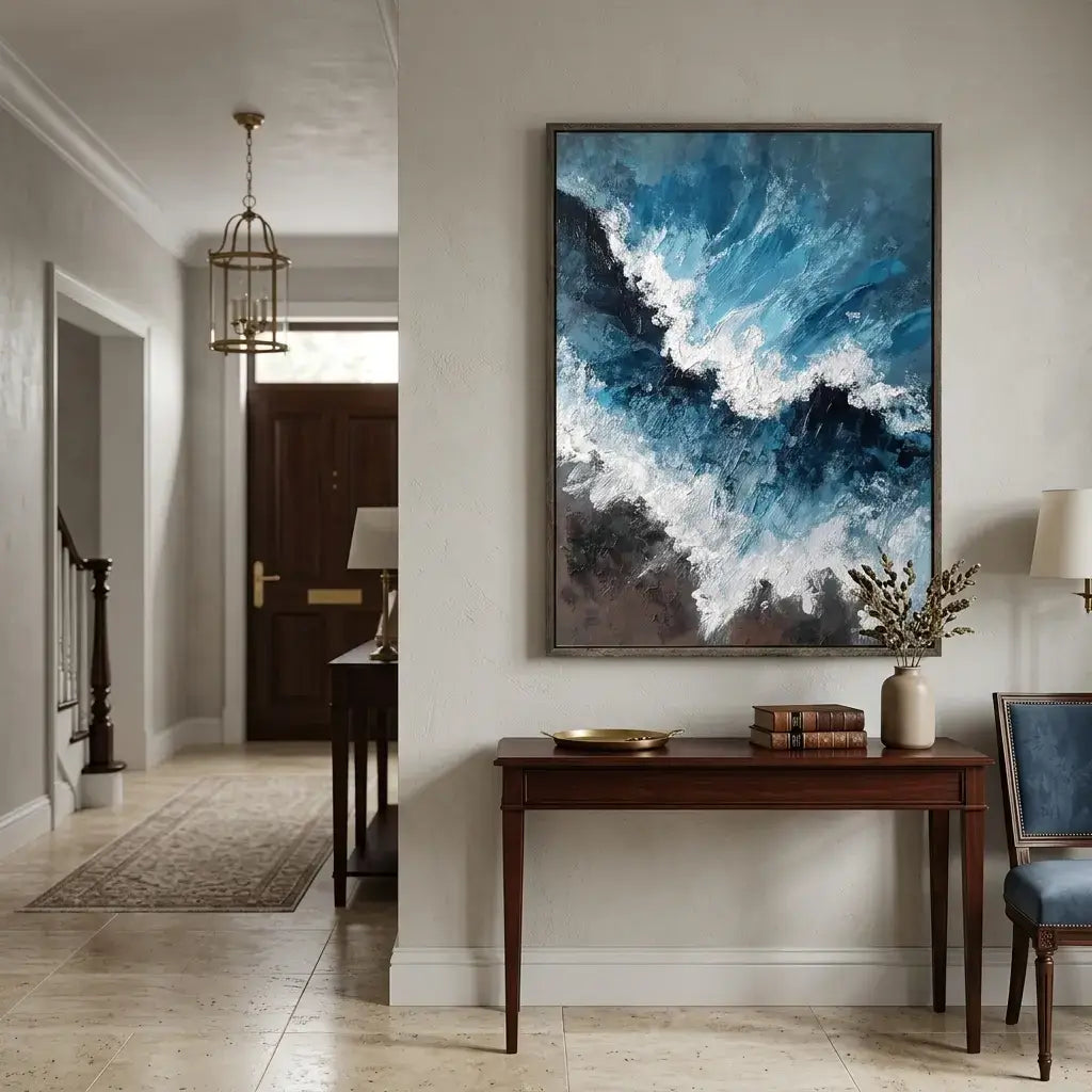Modern interior with abstract art on the wall, wooden console table, and chair.