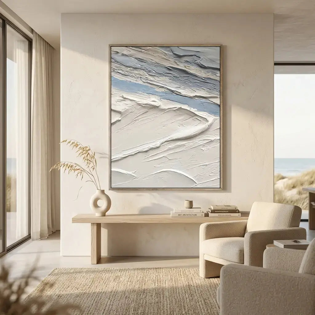Modern living room with abstract art on the wall, neutral decor, and natural light.