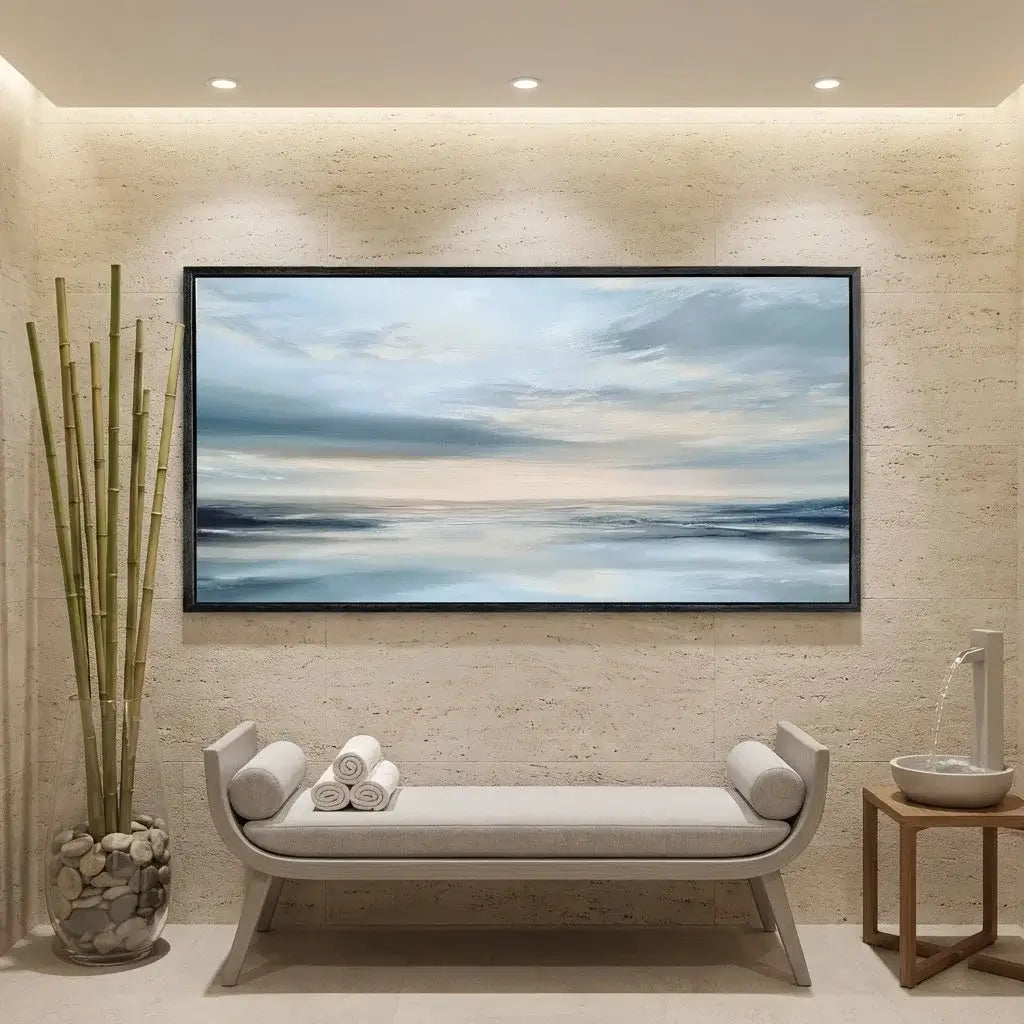 Modern interior with a large wall art, a bench with rolled-up towels, and a small table with a bowl.