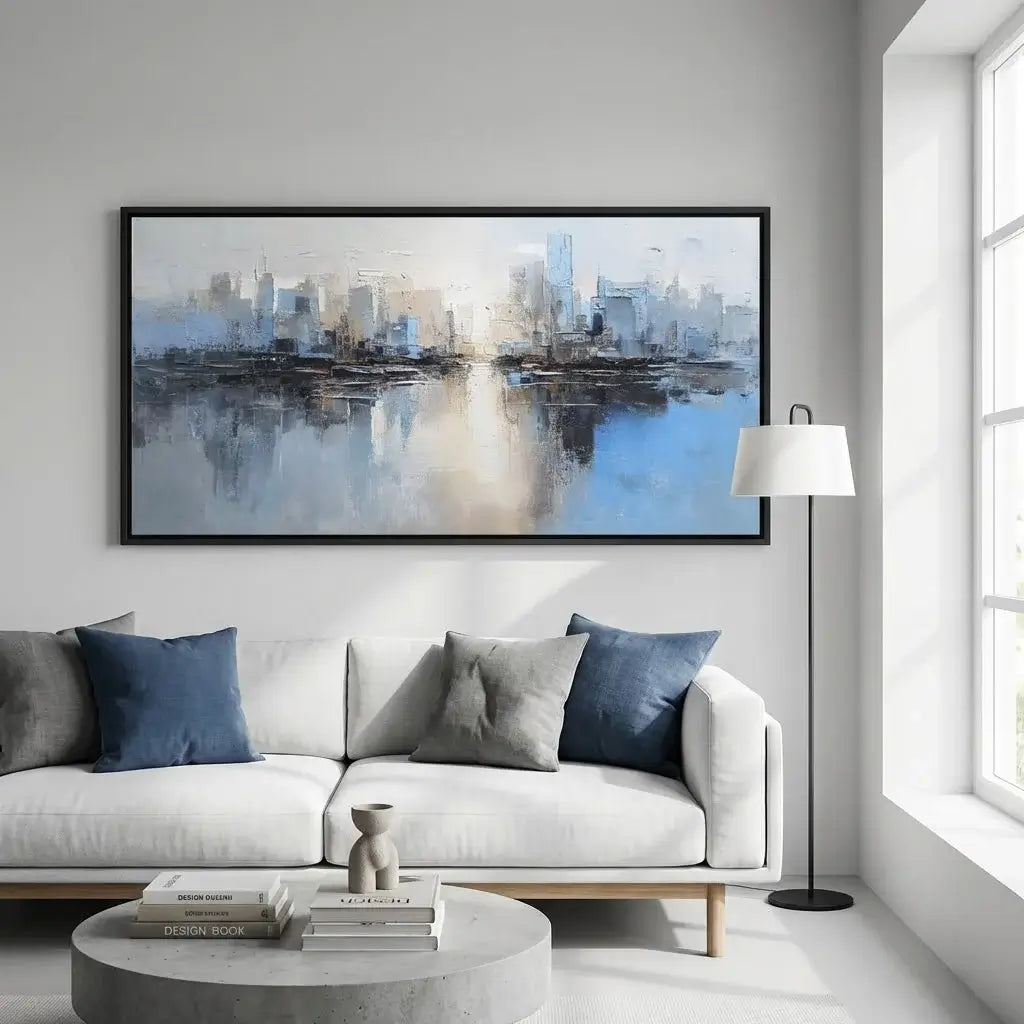 Modern living room with a large abstract painting of a cityscape on the wall.