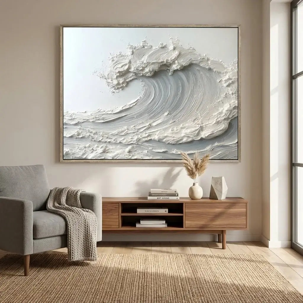 Living room with a large abstract wave painting on the wall, a gray sofa, and a wooden console table.