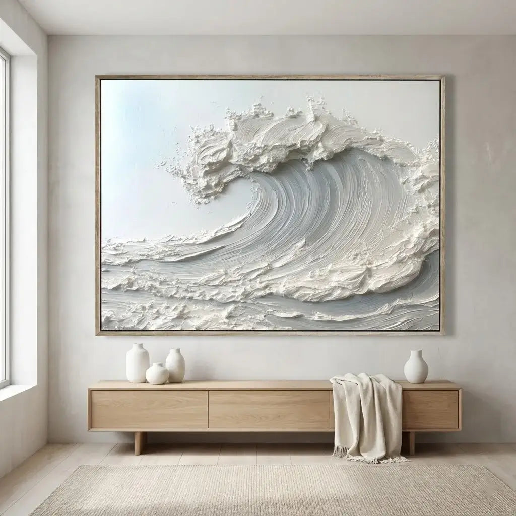 Framed abstract artwork of a wave on a wall in a modern room.