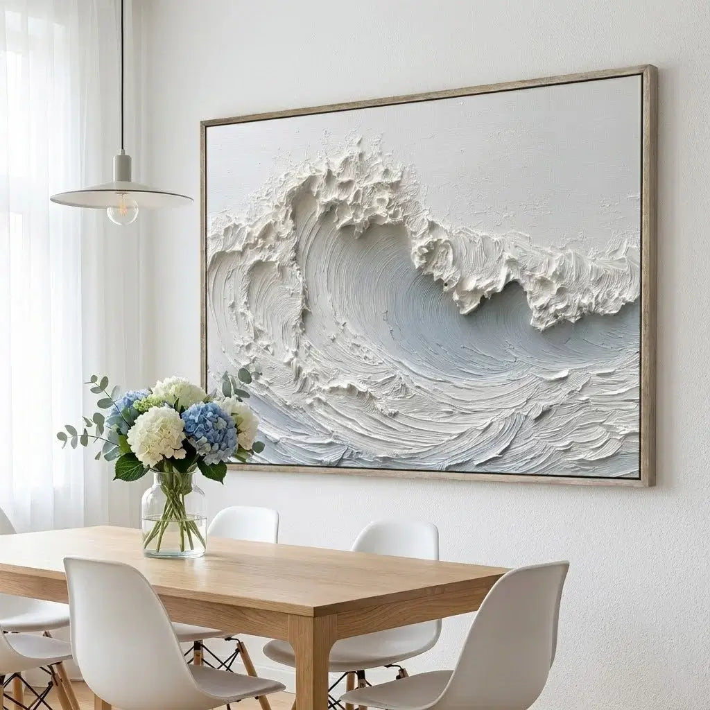 Dining room with a large abstract wave painting on the wall, a wooden table, and white chairs.