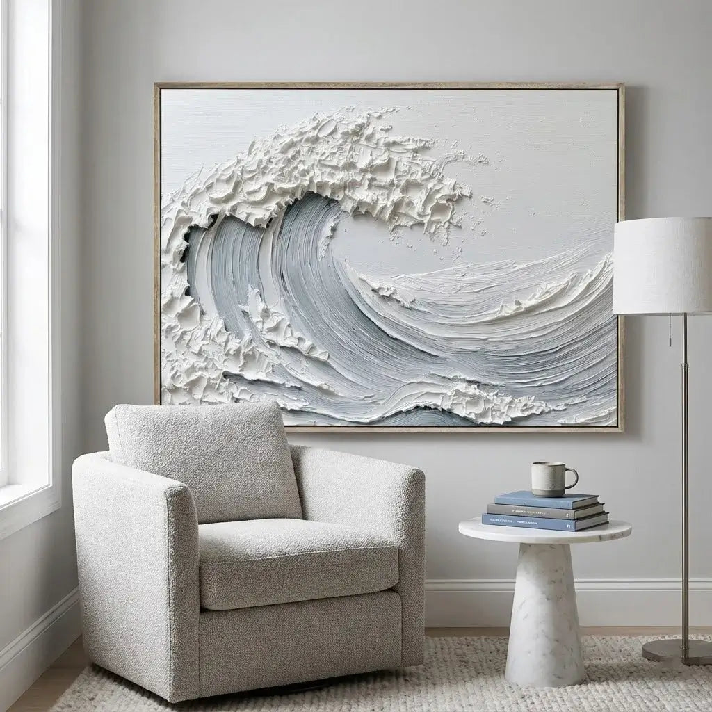 Modern interior with a textured wave painting, armchair, and side table.