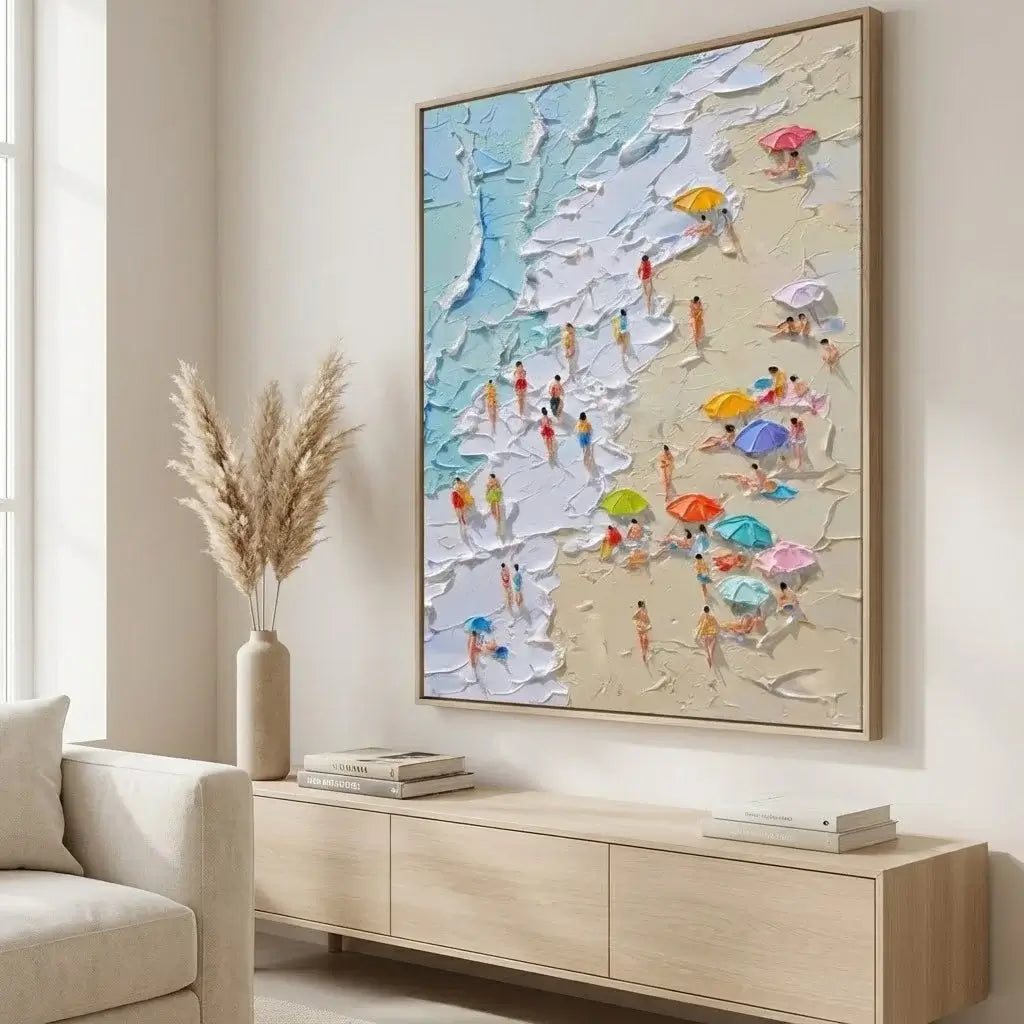 Colorful beach scene painting in a living room with a vase and books on a wooden cabinet.
