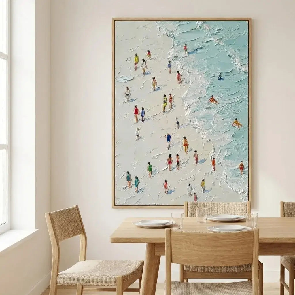 Dining room with a large framed artwork of a beach scene on the wall.