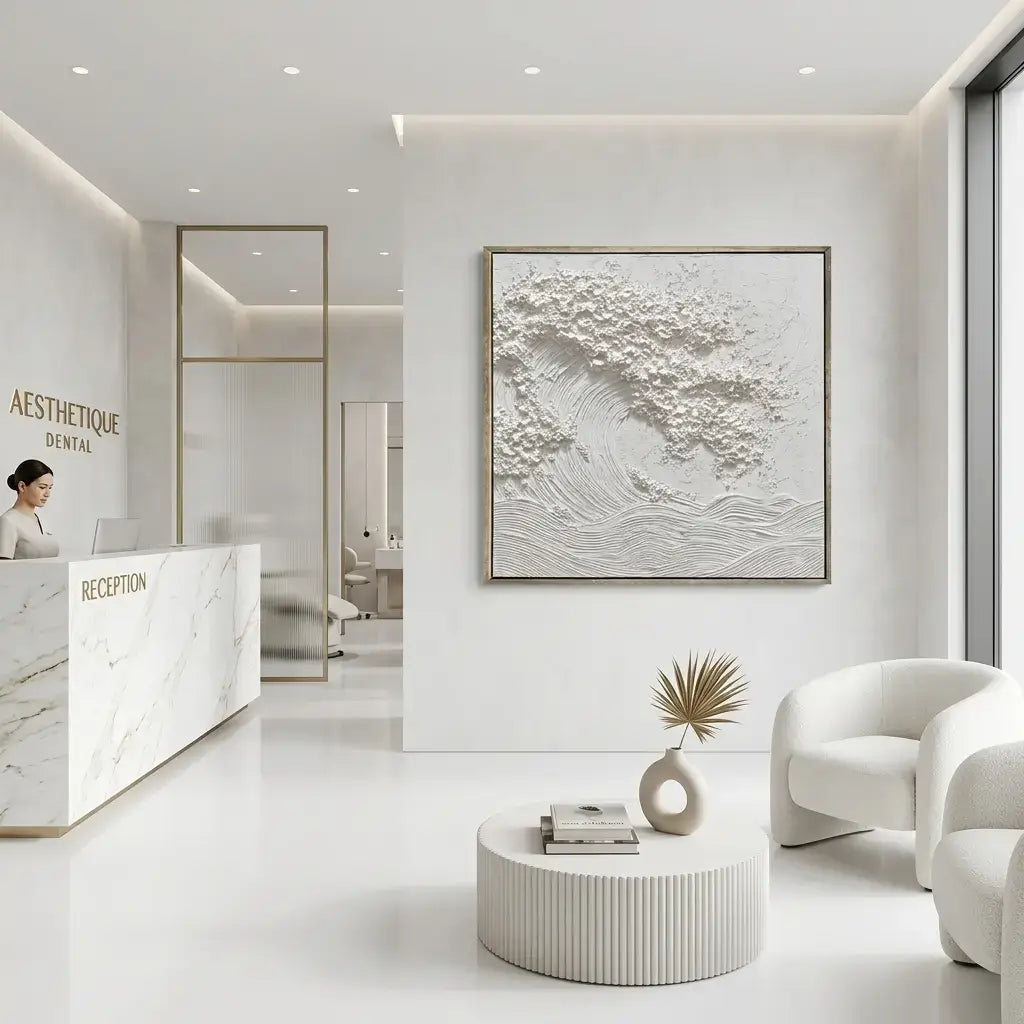 Modern dental office interior with reception desk, chairs, and artwork.