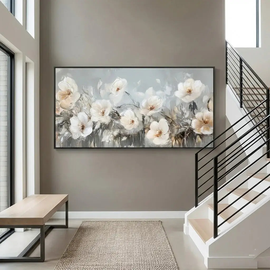 Floral painting on a wall in a modern interior setting with a bench and staircase.