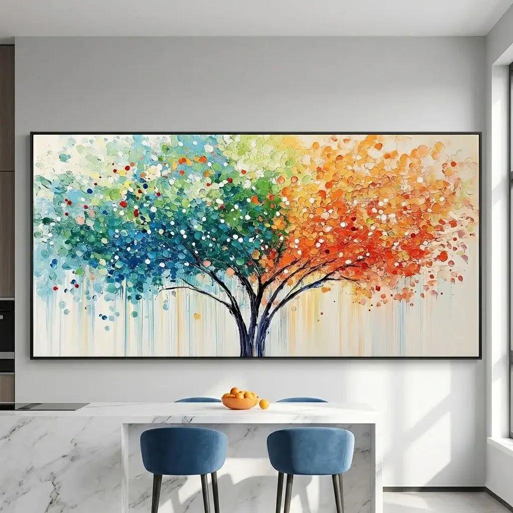 Colorful abstract tree painting on a wall above a dining table with blue chairs.
