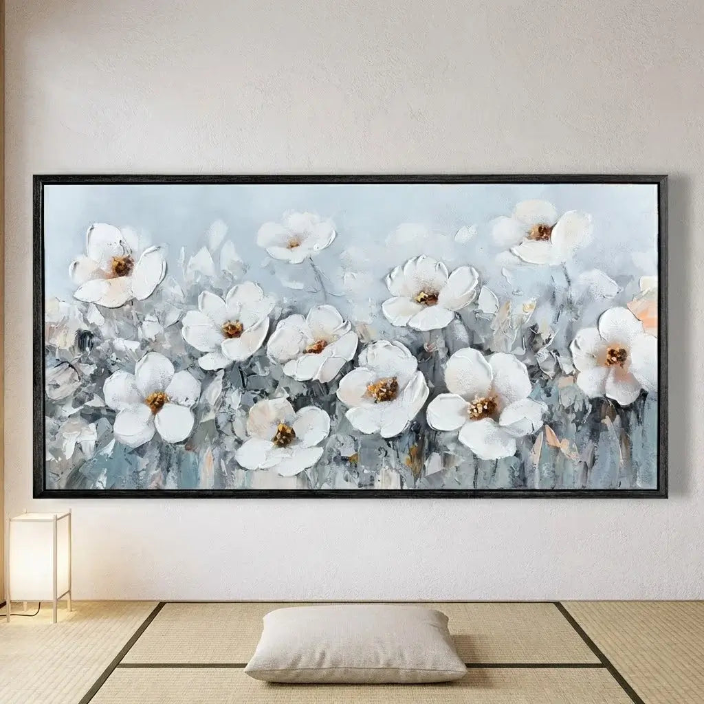 Framed floral artwork on a wall in a room with a light-colored floor.