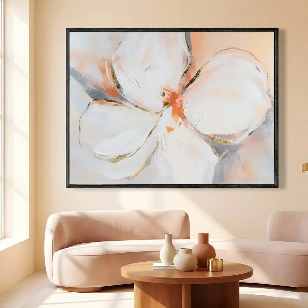 Framed abstract floral artwork on a wall in a living room.