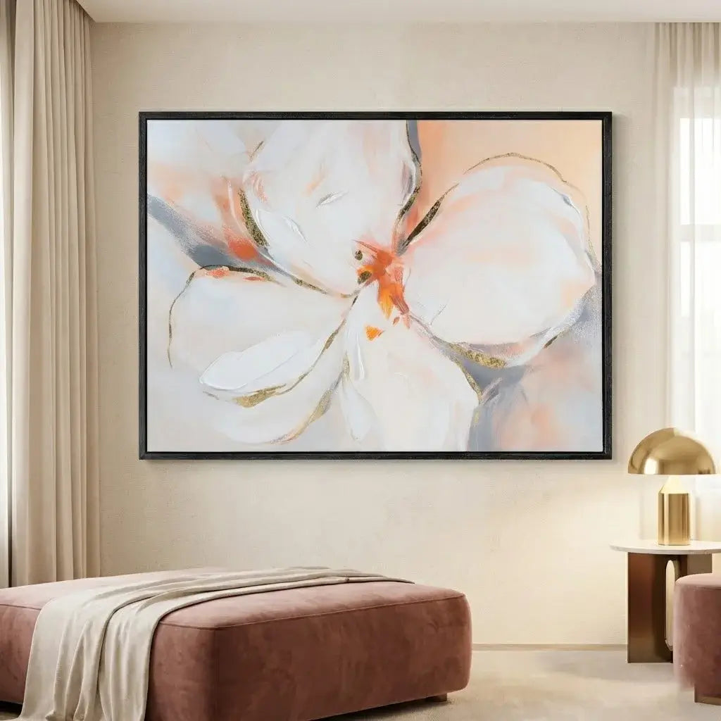 Framed abstract floral artwork on a wall in a living room setting.