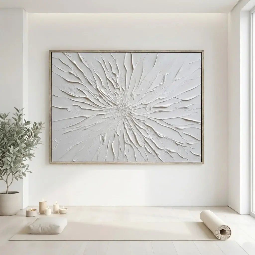 Abstract wall art in a modern interior setting with a plant and candles.