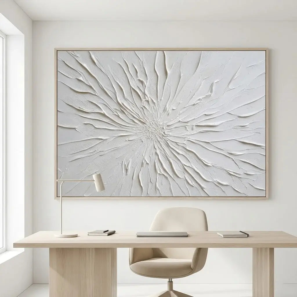 Modern office setup with a large abstract wall art piece above a desk.