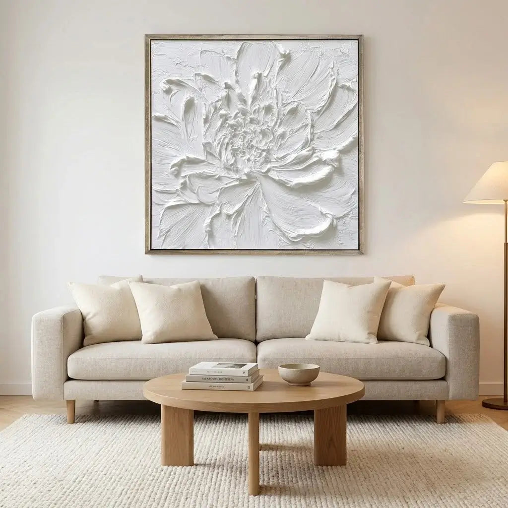 Living room with a beige sofa, wooden coffee table, and large abstract floral artwork on the wall.