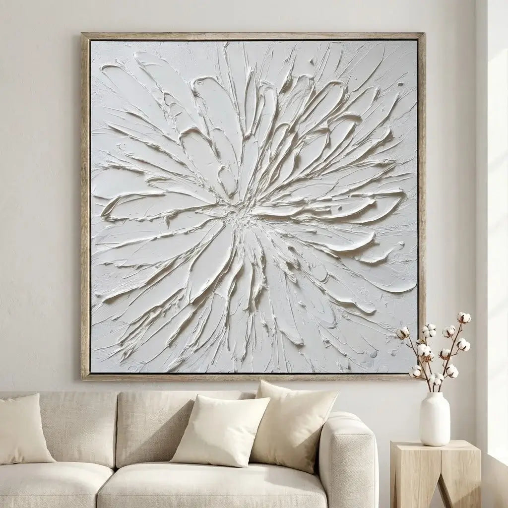 Abstract wall art in a living room setting with a sofa and decorative vase.