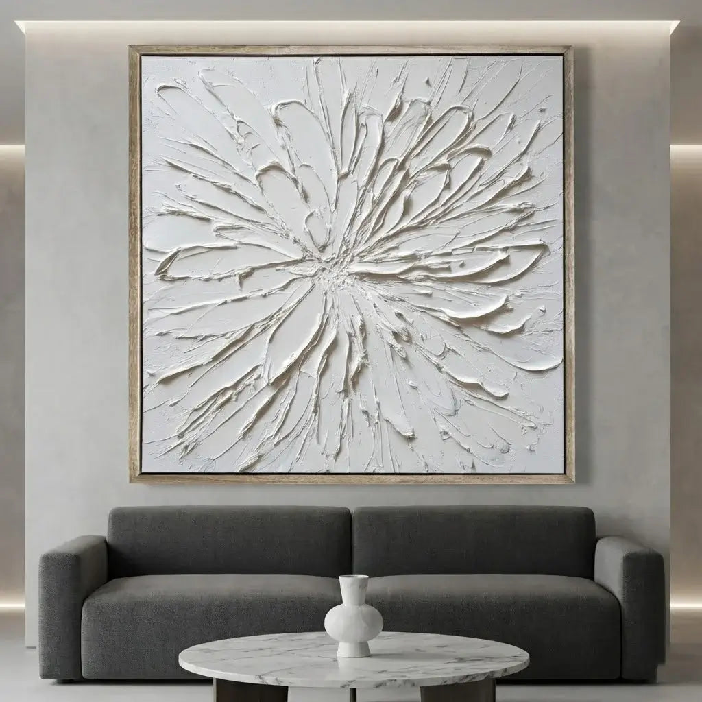 Abstract wall art above a gray sofa in a modern living room.